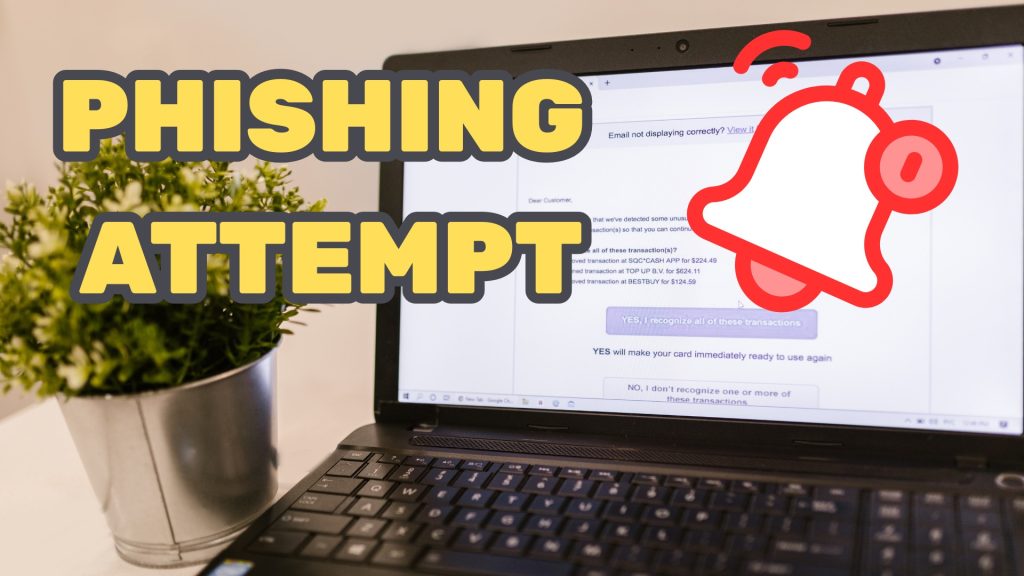 Laptop computer displaying an email message. in the background Alarm bell ringing in foreground. Image text: Phishing Attempt